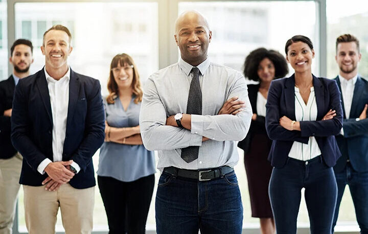 A group of people standing in front of each other.