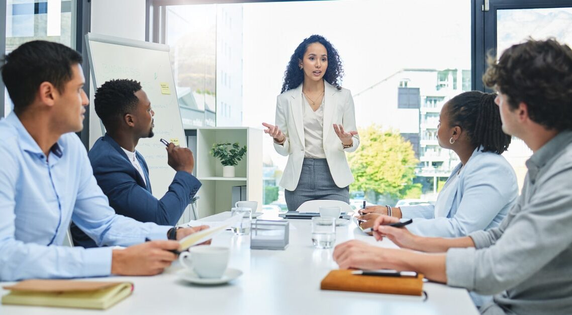 Business meeting with a woman presenting. - 18656